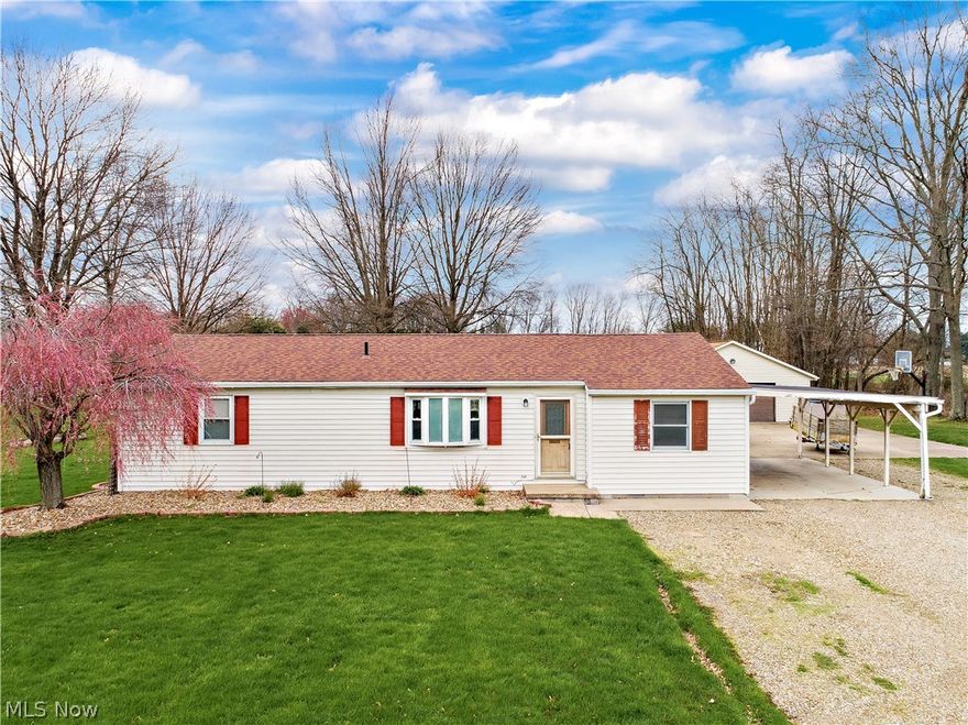 Welcome to 12871 Shank Rd., Doylestown. Looking for a ranch with a little bit of country? This '87 built ranch home features large living room with skylights and ceiling fan. Kitchen has new glass tile and newer microwave, plus snack bar that opens to living room.  Large dining room with bayed window and laminate flooring. Three bedrooms and one bath on the main floor. Finish basement allows for additional living space plus exercise area in addition to a half bath. All this on 2.2 acres which includes  a 28 x 32 garage, as well as an above ground pool surrounded by a deck. Garage is wired for 220. Check out 12871 Shank Rd, Doylestown today!