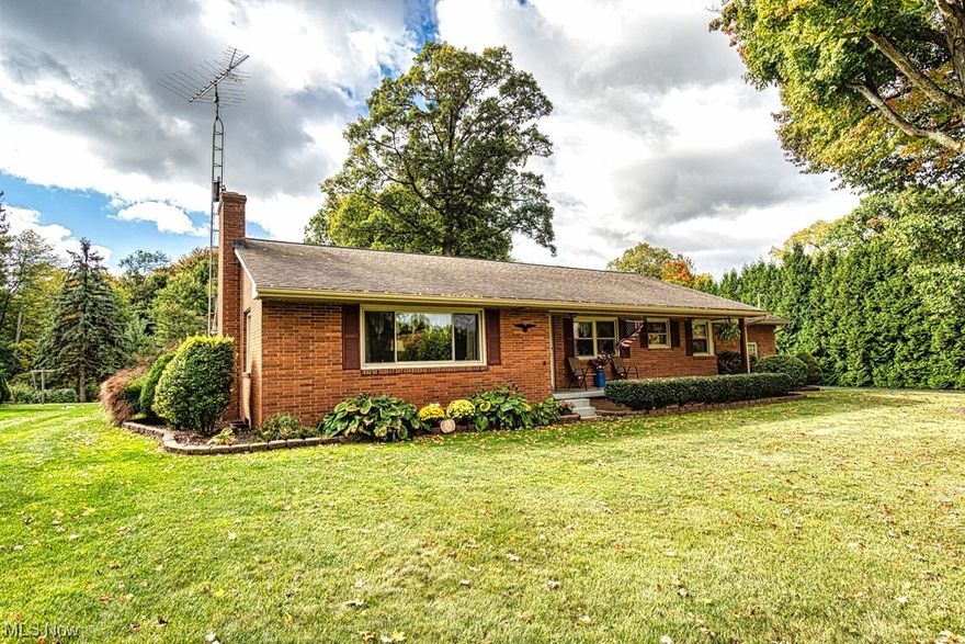 This exquisite brick ranch home offers the epitome of desirable country living, featuring two bedrooms with the potential for a third, and two well-appointed bathrooms. The highlight of the property is the expansive all seasons room, adorned with large windows crafted, by the owner, from wood sourced from a majestic ash tree within the yard, creating a serene connection to nature. Additionally, the home boasts a convenient two-car attached garage, complemented by a detached two-car garage, all with beautiful landscaped surroundings. The paved driveway and recent upgrades, including a new furnace, hot water tank, and AC in 2022, a newly installed septic system in 2021, and a drilled well in 2019, ensure modern comfort in this idyllic country setting. This the one you
have been searching for…..call now to see this great home.