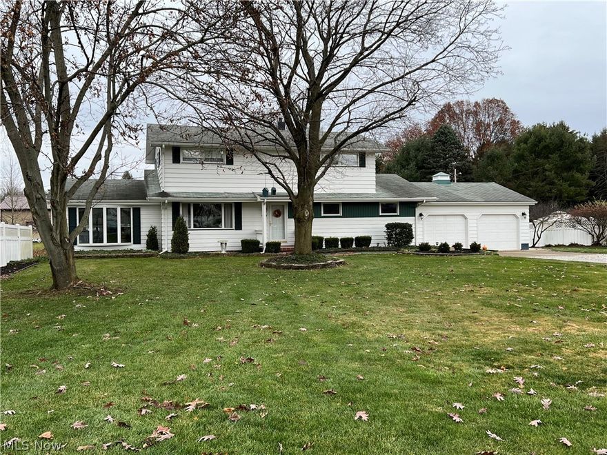 Spacious 4 bedroom, 2 bath home.  Crown molding in the living room.  Maple kitchen with island includes the slate stainless steel appliances.  First floor bedroom and bath.  Tongue and groove cathedral ceilings in the sun room with access to the 15 X 8 covered porch and pavered patio.  Walk in closet in the master bedroom.  Double closets in two additional second floor bedrooms.  Thermo windows throughout.  2 car attached garage.  22 X 12 heated/insulated workshop with 9 X 22 carport.  Nice Southside location with 0.70 acre lot.  The taxes reflect the seller receiving a homestead credit of $359.34 annually.