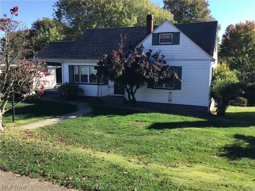 LOCATION, LOCATION! Curb appeal on this Cape Cod home in desirable Rand Avenue.  This 4 bedroom 3 bath home has open floor plan-living room, dining room w/hardwood floors, Great room w/fireplace laminate and ceramic flooring, lots of windows throughout for the natural lighting. Master suite has full bath w/ceramic flooring.  Large master w/2 closets and sliding door to private deck.  Family bath features walk-in shower, new toilet, hardwood flooring.  Large bedroom with walk-in closet and laminate flooring. Spacious kitchen with a pass through to Great room, ample cabinetry, wood floor, double oven gas range, dishwasher.  Second floor consist of 2 bedrooms. Larger of the 2 has hardwood floor, walk-in closet and storage galore, other has carpet over hardwood, walking closet and ample storage.  Hallway has hardwood, bookshelves and entrance to a very large attic.  Lower level 25x15.8 rec room French door leading to covered 27.4 x 11.7 patio for your entertaining and relaxing.  Laundry ro