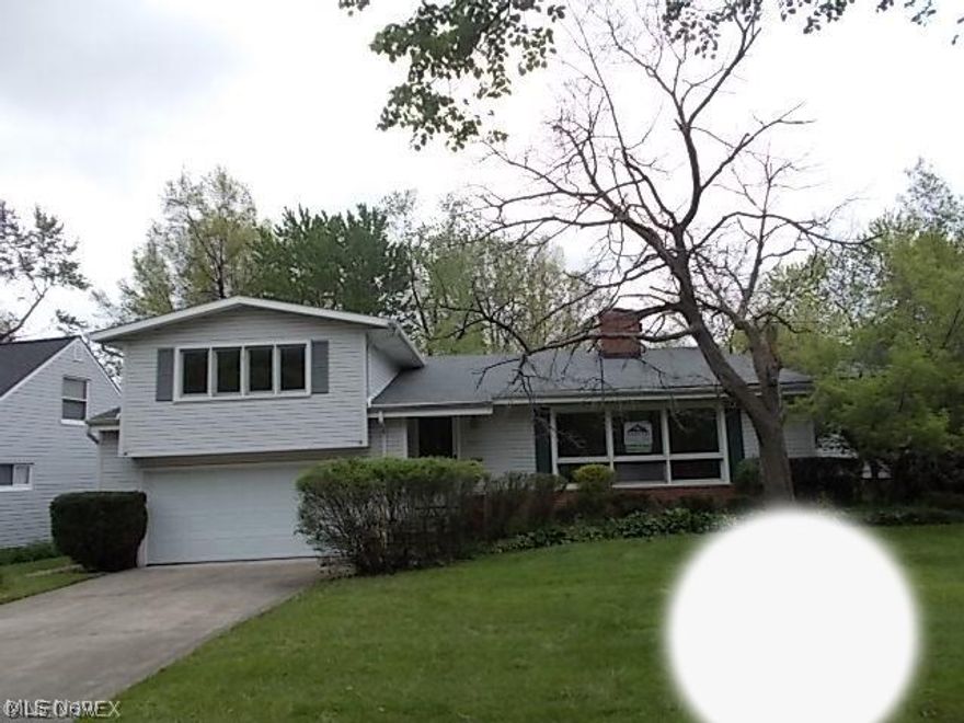 Nice, vinyl sided 3-level split with fully fenced yard. Family room has beamed ceiling & woodburning fireplace. Eat-in kitchen, powder room, large utility room & pantry complete the lower level which has access door to back yard. The living room features a large picture window, 2nd fireplace & cathedral ceiling. The 4 bedrooms plus 1 full bath are located on the upper level. Just a 20 minute drive to University Circle. Owner Occ. Buyers & Agents must sign OwnerOccupant Certificate found in MLS Attachment in order to make offer.  This is a Fannie Mae HomePath property. Purchase this property for as little as 5% down!