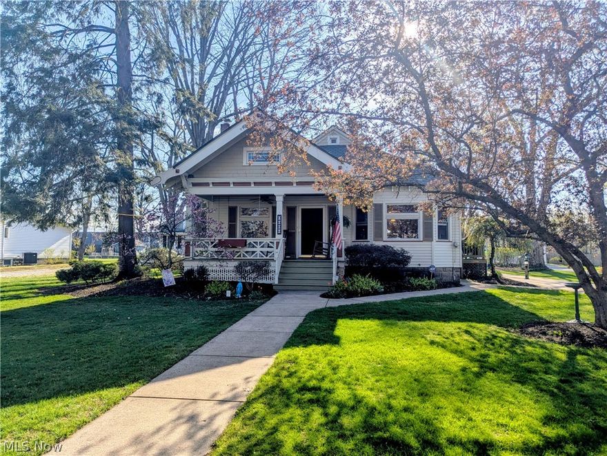 Character and Charm run throughout this very well maintained 1923 home that rests in the Heart of Historic Old Mentor! This home offers over 2700 sq ft of living space! The welcoming covered porch leads you to the living room with it's hardwood flooring and gas fireplace!  This Hart St. home boasts 3 bedrooms and 3.5 baths with a heated floor in the upstairs full bath! Enjoy the built in features, wood beamed ceilings, and all of the additional wood craftsmanship throughout!  A custom eat-in kitchen with hardwood flooring, granite and corian countertops, and a breakfast bar. The dining room is encompassed with wood walls to offer warmth and extra charm! The generously sized vaulted great room has high ceilings, a second gas fireplace, pool table, french doors to the deck, it's own half bath, and a wet bar for entertaining.  The upstairs suite is private with a custom bathroom, sky lights, and walk-in closet. The basement has an abundance of storage and you will find it's own full bath AND your very own sauna!  The beautiful deck off the back of the house overlooks the private and very deep backyard. A two car garage sits at the end of the concrete driveway with a shed behind it for additional storage!  Beautiful landscaping all around the home for that finished added touch! New A/C, 220 in the garage, and the pool table can stay! So much to see so schedule your appointment for your own private showing!