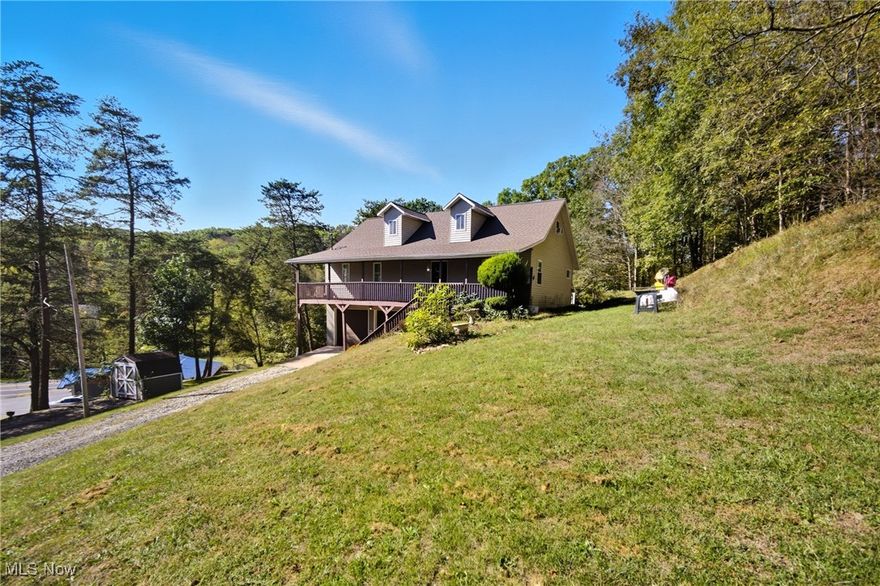 PRICED BELOW APPRAISAL!!! PRICED TO SELL & IMMEDIATE OCCUPANCY!!! SELLER NOW HAS A CERTIFIED HOME INSPECTION COMPLETED FOR POTENTIAL BUYERS AVAILABLE UPON REQUEST AND ALSO IS OFFERING A 1 YR HOME WARRANTY FOR YOUR PEACE OF MIND!!! Enjoy the best of both worlds in this beautiful 4 bedroom 2 1/2 bath home located in Washington, WV on beautiful 1.28 country setting nestled in the woods but within 10 minutes to downtown Parkersburg. New flooring throughout the main floor. Large eat in kitchen boasts stainless steel appliances, double wall oven, built in gas stovetop, tile backsplash, touchless faucet and under cabinet lighting. Improvements to the home include new motor for ac unit, upgraded garage doors, newer roof with lifetime warranty, triple reverse osmosis water filtration system in the kitchen and new light fixtures throughout home. Three of the four bedrooms have walk in closets and there is additional storage available in the eves of one of the upstairs bedrooms. The two stall garage includes a project room in the rear opening to the large yard and garden. Outdoors you will enjoy a rolling peaceful setting complete with flowers, herbs and vegetable gardens, 2 firepits and a storage building. Tucked away to feel secluded but only minutes from town. Built in 1999 this home is beautifully maintained and move in ready! Give me a call for your own private showing or contact your local realtor because this one won't last long!!!