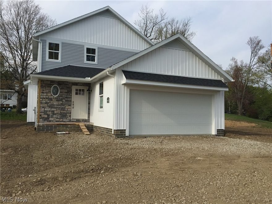 New construction at its best.  All the features that buyers are asking for.  Foyer entry opens to an open plan providing a large great room with cathedral ceiling, dining room with triple windows  and kitchen complete with contemporary cabinetry, granite counter tops, stainless steel appliances, wood floor and pantry.  First floor master with full bath, walk thru master closet leads to the laundry.  Powder room for guests. Mudroom entry from the garage.  Second floor provides two large bedrooms, loft/ office and full bath. Two car garage. Full finished basement with additional full bath. Immediate possession. Access from Westlake.