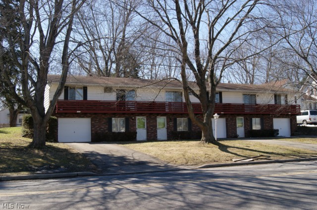 Family-owned three well maintained apartment units with ground floor garage, laundry/utility room and family room entry. Each unit has complete eat-in kitchen with updated appliances, two bedrooms, one bath, large living room with slider doors to front deck. Center unit has 10x10 screened-in patio-porch off kitchen entry. Utilities separate and charged to each unit. Building well maintained. 8x10 maintenance shed and 16 HP lawn tractor included with sale for lawn care.