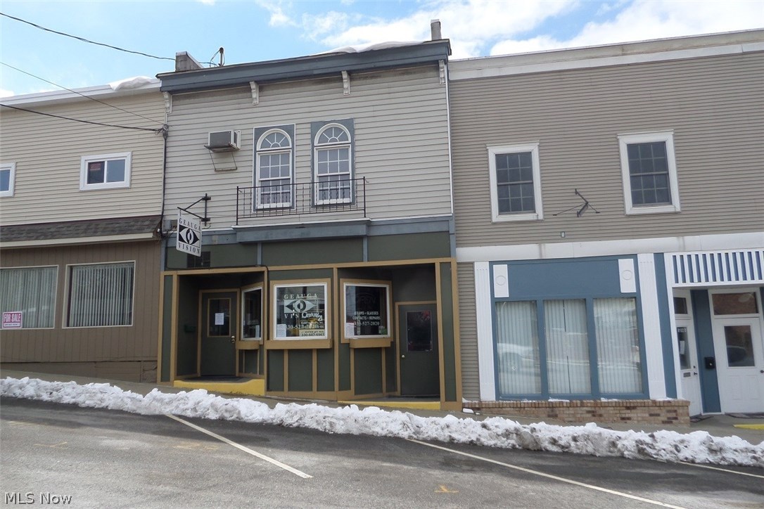 Fantastic opportunity to own a waterfront store and apartment in downtown Garrettsville! Three huge picture windows in the front so anyone walking by can see what your business is all about! What a great place to hang out on either deck ( deck on main and deck on second floor) overlooking the boardwalk! Formally known as Geauga Vision! So many possibilities! First floor has a large open area, separate office/room, half bath and newer deck overlooking Eagle creek! Huge basement with half bath, high ceiling and door leading to the rear. Second level has it's own entrance and would make an awesome studio apartment! Just add a small kitchenette as it already has a full bath and newer deck! It would be so neat to have an ice cream/popcorn shop here just like in Chagrin Falls! Bring your business to this booming little town of Gville! Maybe even a juice bar, candy shop, arcade for the kids, donut shop or meat shop! Rent potential can be $795 for first floor and $595 or more for studio apar