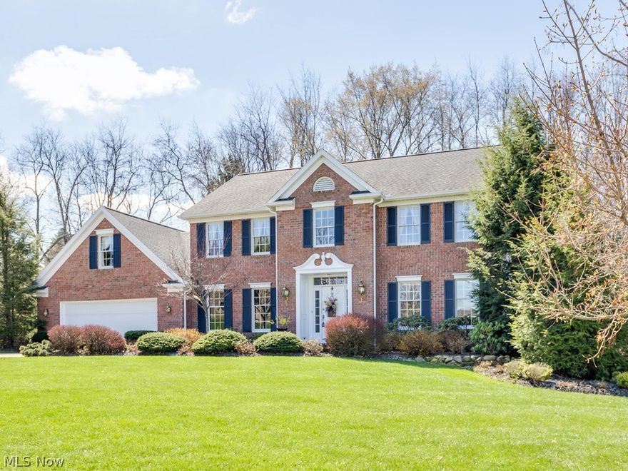 Fabulous inside & out! Quality custom built one owner 4 bedroom, 2.5 bath colonial with 2800SF (main level & up) with oversized approx. 25x24 2-car garage* Foyer entry with curved staircase, wood floor & picture frame wainscoting* Den with extra wide crown molding* Formal dining with extra wide crown & chair rail* Great room with brick fireplace, extra wide crown, fan & triple window/door to deck* Eat in kitchen with extra wide crown, atrium door to deck, breakfast bar, built in desk/work area & roll out shelves, chefs pantry, stainless refrig, gas range, dishwasher plus microwave* 1st floor laundry with access door to deck, cabinet/counter space & utility sink* Half bath with double crown* 1st floor 4th bedroom or office (doesn't have closet)* Vaulted master with fan, 2 walk in closets, skylight, jetted tub with Palladium window, separate shower, double vanity with dressing table (master bath approx. 2013)* 2nd bedroom with walk in closet & private access to guest bath* 3rd bedroom wi