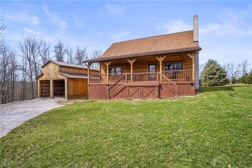 Escape to the perfect blend of rustic charm and modern comfort with this custom log cabin retreat, set on just over 4 breathtaking acres in the picturesque countryside of Paris, Ohio. This meticulously crafted sanctuary offers a serene escape while delivering all the conveniences of contemporary living.  

Inside, rich hickory cabinetry, Corian countertops, and stainless steel appliances create a stunning yet functional custom kitchen. A built-in table and island with a cooktop make it an inviting space for culinary creativity and casual dining. The open, vaulted ceilings enhance the living area's spacious feel, while a cozy fireplace adds warmth and ambiance for those cold Ohio winter days and nights.  

With two bedrooms on the main floor, two full baths, and a versatile open loft —ideal for a 3rd bedroom, home office,  entertainment space or whatever meets the needs of your lifestyle —this home is designed for comfort and flexibility. A first-floor laundry room adds convenience, and the finished walkout basement provides even more living space for entertaining, gaming or even a third bedroom.  

Outside, a 24 x 36 detached garage with a loft offers tons of storage space. The expansive deck is the perfect spot to soak in the peaceful natural surroundings. Whether you're looking for a private retreat, or a permanent residence, this property delivers tranquility and serenity. 

The owner is currently in the process of subdividing the current parcel. The buyer has the option to purchase an additional 10.52 acres for a separate purchase. 

Don't miss your chance to own this one-of-a-kind log cabin retreat. Schedule your private tour today and experience the ultimate in countryside living!