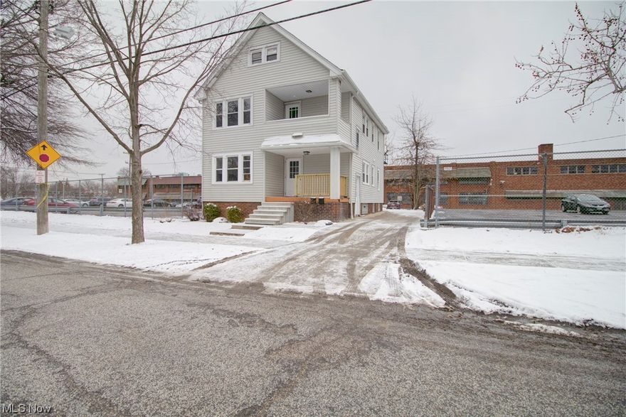 Attention investors! Add this one to your portfolio and bring in the rents to make the payments and more each month! This 2 family home has 2 bedrooms each suite, new kitchens, new baths, new windows, new hot water tanks, new furnaces, new central air, refinished hardwood floors, balconies off back of house, decorative fireplaces and close to all amenities. Siding and roof is 14 yrs. old.  A bonus for you, is a huge finished third floor with full bath, a perfect little rental for one family member, student etc. This unit also has it's own electric meter. You'll love the many amenities close by with the restaurants, park and beautiful Lake Erie. All units vacant so you have a clean slate!