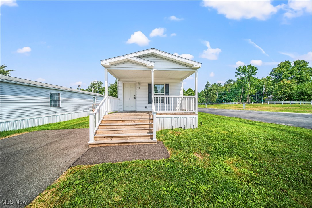 Welcome to this stunning brand new 2 bedroom, 1 bath manufactured home, perfectly situated near the shores of Lake Erie and a prestigious golf course! As you step onto the inviting front porch, you'll feel right at home. Inside, the spacious living area flows seamlessly into the large eat-in kitchen, complete with: - Ample cabinet space for all your storage needs - Brand new stainless steel appliances, adding a touch of modern elegance The open floor plan is perfect for entertaining or relaxing with family and friends. With two generously sized bedrooms and a convenient bathroom, this home has everything you need to live comfortably. Enjoy the beautiful scenery and outdoor activities that Lake Erie has to offer, or tee off at one of the nearby golf courses. This home's prime location provides endless opportunities for recreation and relaxation. Don't miss out on this incredible opportunity to own a brand new home in a desirable location. Schedule a viewing today and make this house your dream home!