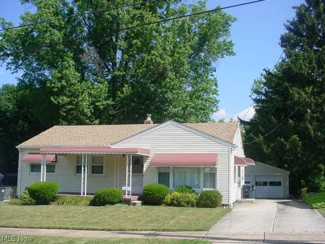 Well maintained one owner home! 3 bed 1 1/2 baths w/2+ detached garage! Extra deep back yard! Concrete drive w/extra parking! Hardwood floors! Wet bar in basement! Replacement windows, central air, vinyl siding and covered front porch! Updated electric! Eat in kitchen! Mineral rights transfer w/sale.