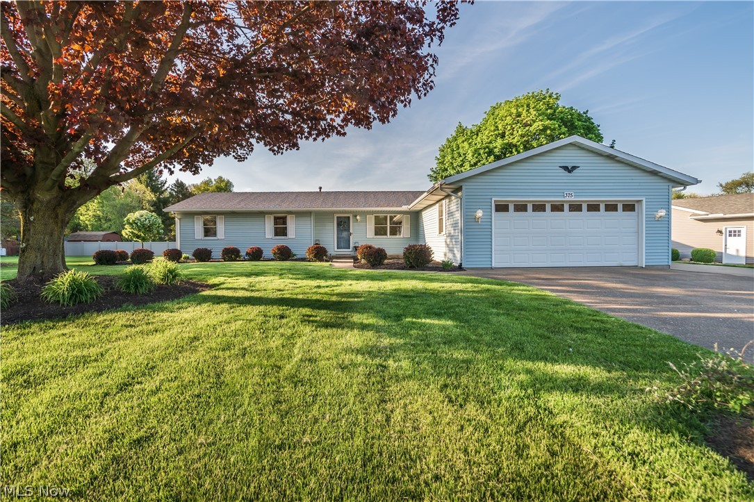 Welcome to 375 Rivermoor Dr. This beautiful conventional style ranch home sits on the outskirts of the City of Mogadore. Easy, one floor living in this immaculate move in ready three bedroom, two bathroom, vinyl sided home with an attached 2 car heated garage. With a large eat-in kitchen, as well as a formal dining room, this home offers plenty of space for entertaining. Not only does it offer plenty of space for entertaining, but also convenience; with the laundry room on the main level, you will never need to leave the main floor. Off the laundry room is the door that leads you out to the covered porch and concrete patio that is open to your spacious backyard, as well a gated entry from the extended driveway where you will find additional parking. The heated garage has a separate thermostat and unit than the home and both the garage heater and home furnace were serviced in October 2021. In the garage you'll find built-in storage as well as a new garage door opener. Inside the home yo