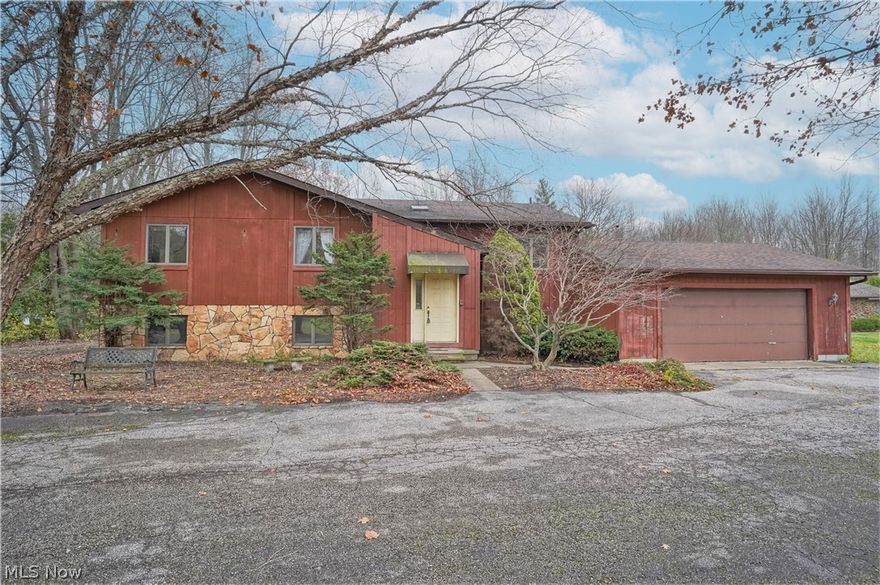 Do you need space inside and out? Then this is it! 3.49 Acres with private woods and over 3600 sq foot home with 6 Bedrooms and so much more! The sellers built this home with love, care and years of thought. They made sure there was room for everything! The main floor features a spacious Living Room with Stone WBFP accent and Dining Area that leads into the Oak Cabinet lined Eat In Kitchen and Large Dinette Area with panty. Primary Bedroom Suite has Private Full Bathroom with WI Stall Shower, Double Closets and connect to a Private Library accented with wall of Book cases and French doors that lead to the Living Room or out to a Private Deck. Additional Full Bathroom and Two Bedrooms finish off the main floor. The lower level is such a welcome surprise with Huge Family Room with beamed ceiling built with double i Beams to allow no posts to obstruct anything, Brick WB Stove and Wet Bar which all make for an amazing entertaining Space. Three More generous sized Bedrooms, Full Bathroom, O