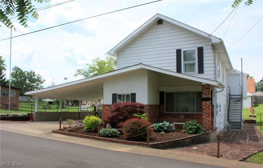 Home is 2 story without basement with double carport on a double lot (90x135) with storage building in back with inside horseshoe pit.  Square footage does not include 2nd floor rec room and measures 204 sq. ft.  Heating is vented wall heater in dining room for first floor  and floor furnace for second floor.  Air conditioning is 3 window units and one portable unit.  Half bath on first floor and around corner is shower in laundry room making full bath not all together. Seller has obtained estimates for central heat/air which can be negotiated in a contract if desired.
