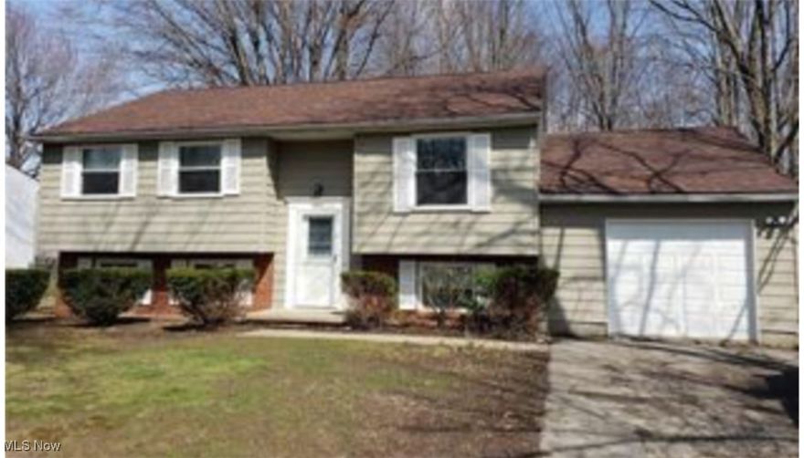 Truly lovely home that's situated in a very sought-after neighborhood and is located on a quiet, peaceful street, offering a great sense of tranquility. The interior boasts an incredible kitchen that has been thoughtfully updated with modern features, including soft-close cabinets, attractive and durable vinyl plank flooring, elegant quartz countertops, and a full set of stunning stainless steel appliances. For convenience, there's a well-appointed bathroom on the main floor complete with a tiled shower. Additionally, you'll find another full bathroom on the lower level. This property also offers excellent parking and storage options. It includes a convenient single-car attached garage, as well as a beautifully rebuilt two-car garage located in the backyard. Access to the rear garage is made easy with a concrete driveway that extends to the back of the home. To further enhance the outdoor space, there is a deck at the back of the house, perfect for relaxing or entertaining. You'll also find a newer shed on the property, providing valuable additional storage space. Schedule your private showing today.