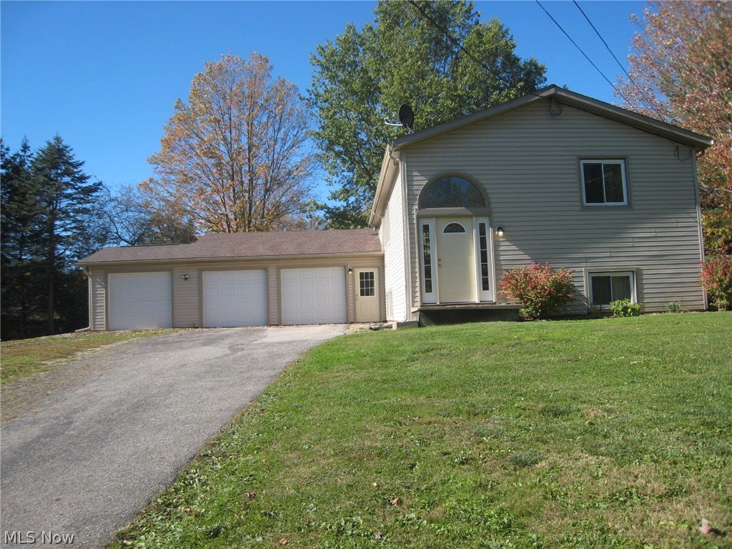 What a peaceful setting! This beautiful home sits on 4 private parcels. It has a 4 car garage as well. There are 2 bedrooms on the first level and a full bath. The kitchen is fully applianced and has an eating area with a sliding door to the deck. The lower level has a large family room with projector. There is a bedroom and full bath as well as a bonus room that could be a fourth bedroom or office. New laminate flooring through out most of the home. Enjoy the back patio with fire pit off of the deck. There is plenty of room for your cars and lawn equipment with the four car garage. There is new siding on the home has been updated.
the well pump, woodburner, water softening system, refrigerator and dishwasher are all under 3 years old. Home warranty is provided by the seller