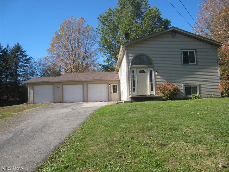 What a peaceful setting! This beautiful home sits on 4 private parcels. It has a 4 car garage as well. There are 2 bedrooms on the first level and a full bath. The kitchen is fully applianced and has an eating area with a sliding door to the deck. The lower level has a large family room with projector. There is a bedroom and full bath as well as a bonus room that could be a fourth bedroom or office. New laminate flooring through out most of the home. Enjoy the back patio with fire pit off of the deck. There is plenty of room for your cars and lawn equipment with the four car garage. There is new siding on the home has been updated.
the well pump, woodburner, water softening system, refrigerator and dishwasher are all under 3 years old. Home warranty is provided by the seller
