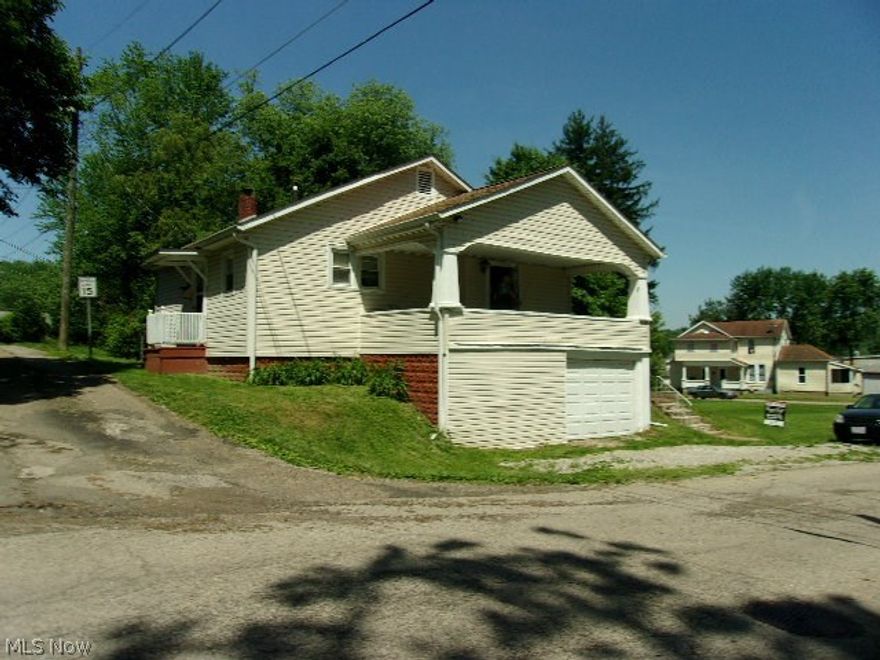 Cute bungalow on Northend.  Completely updated, all appliance kitchen with new flooring, all new paint, large  covered front porch with carpet.  move-in condition.  Full basement with garage. Large double lot.  new lights and ceiling fans in some rooms,  insulated windows, new wiring, copper plumbing. garage door opener.