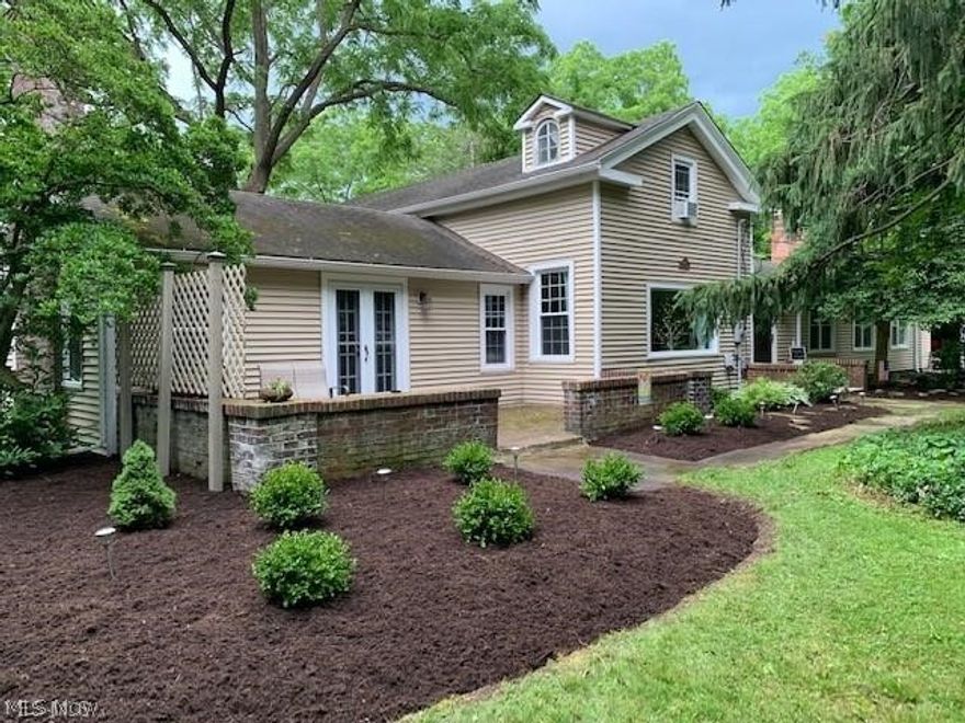 Imagine own a piece of history and write your new chapter in this amazing, century home! Known as “The Fitzwater House” – this updated home has been exceptionally well cared for and is both charming & modern w/secluded, million-dollar views of the Cleveland Metroparks Brecksville Reservation. Current owner planned on living here for a long-time & invested 100K+ in quality updates over the past 3 years. Spacious at 3,008 sf, yet comfortable & warm, the floorplan will delight & welcome you from the moment you enter. The main living room w/restored heart pine floors has a wbfp and is open to the sunroom/solarium w/a wall of windows overlooking the park. Spacious eat-in area adjacent to the kitchen. Hard to find: 1st-floor master bedroom (w/wbfp, sep. sitting area); main-floor laundry, along w/a 2-car att garage. Formal dining room, full bath, & a home office area near garage complete the main level. Head upstairs to 3 generous sized bedrooms which share an oversized, updated hall bath. To