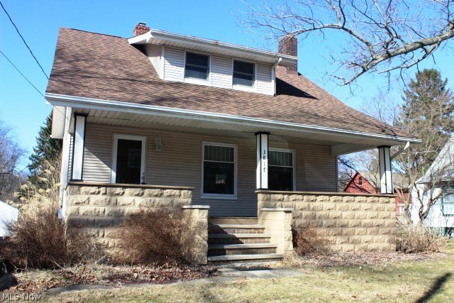 Charming & spacious colonial with 2 bedrooms, 1526SF & lovely natural wood work* Entry with laminate floor & crown molding* Living room with brick fireplace (not operational at this time), built in glass cabinet & crown molding* Formal dining with crown molding, window seat & fan* Eat in kitchen with breakfast bar, ample cupboards, ceramic back splash, laminate wood like floor, gas range, refrigerator & breakfast room with slider to deck* Huge master bedroom with room for office or work out area & walk in closet* 2nd bedroom with walk in closet* Walk in hall storage closet* Full covered front porch* Two tier deck* Generous size shed* Most windows have been updated plus glass block windows* Vinyl siding* Central air* Convenient location* Lake local schools*