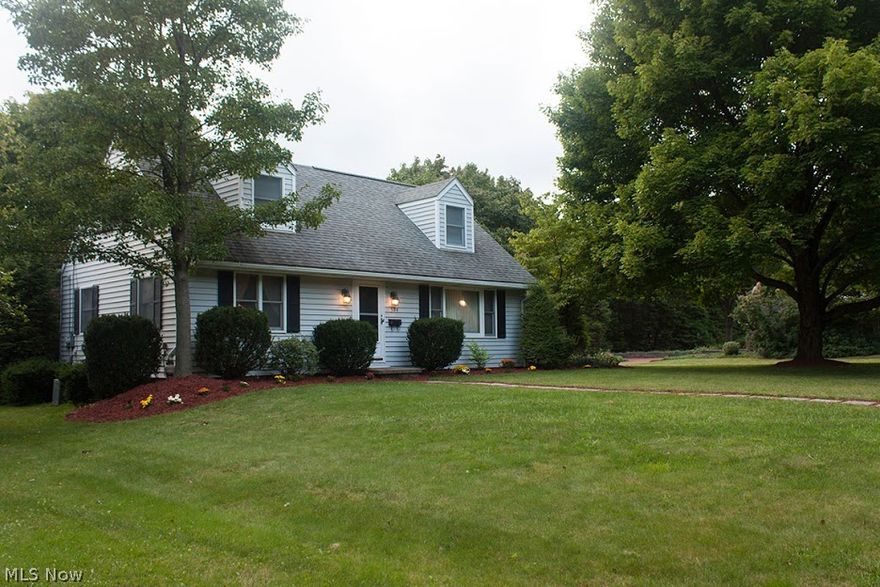 You'll love this well maintained Wadsworth Cape! Super Spacious with a Family Room featuring a Gas Fireplace, Wood Beams and Nice Open Floor Plan. Enjoy the Beautifully Landscaped yard from the Enclosed Patio which is accessible off the Family Room. 4 Bedrooms and 2 Beautifully Updated Baths. Updated Oak Kitchen Cabinets with plenty of Counter Space and Stainless Steel Appliances.  Refinished Hardwood Floors throughout and new Ceramic Tile in Baths.  This home also features a Formal Dining Room as well as a Large Eating Area off the Kitchen. Bedrooms are very Nicely Sized with Dormers. Finished Lower Level with plenty of space for a Theatre Room, Craft Room or Play Room!  Welcome Home to 594 Crestwood!