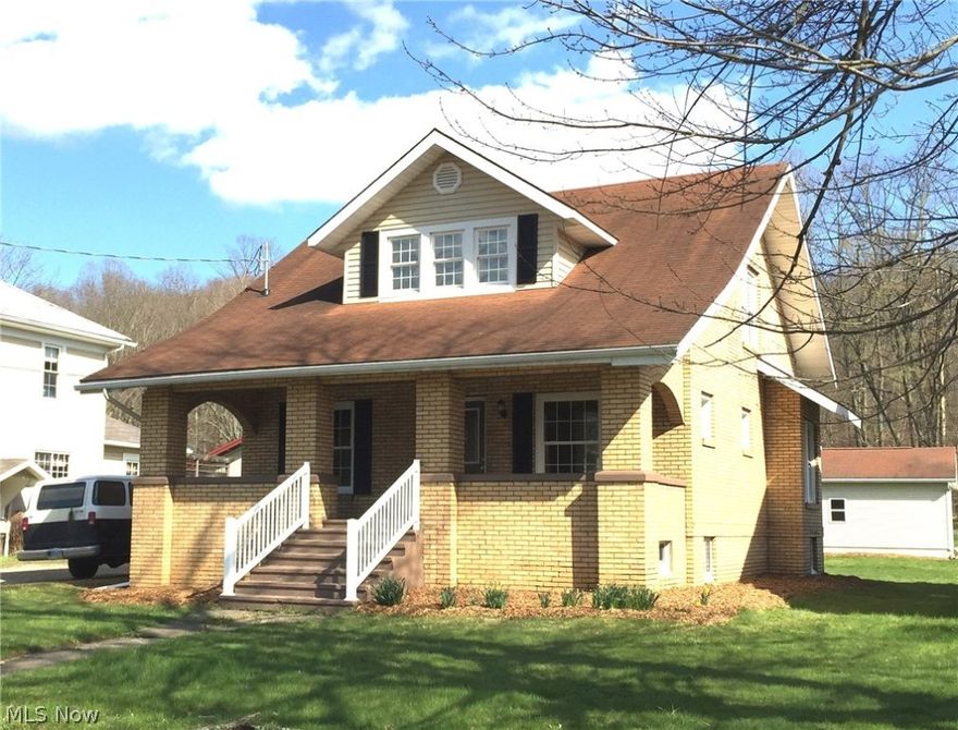 Beautifully remodeled brick home in a great location close to the park! This home has 3 bedrooms, 1 full and 2 half baths and an extra large 3 car garage.  The kitchen is brand new with lots of cabinets and a pantry. There is a fireplace in the living room. This home is bright and airy with all new thermopane windows. There is a covered front and back porch. The bathrooms are brand new along with the electrical, plumbing, flooring, paint and so much more! This home will allow for immediate possession!
