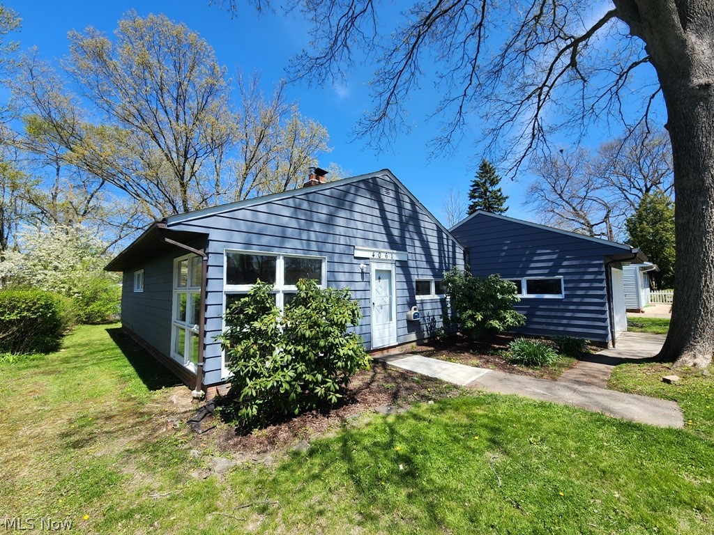 This South Euclid 3 bedroom 1.5 bath ranch home that is recently renovated. Ranch style home offers open floorplan with opening up 3rd bedroom to become additional office or entertainment space. The many upgrades and maintenance include the freshly painted aluminum siding exterior, freshly painted interior, new kitchen cabinets, new laminate floors throughout, hot water tank. Get cozy by the fireplace on those cold winter nights and beat the heat of the summer with the central air cooling system. This home is near shopping, great restaurants and not far from 90. Attached 1 car garage and large driveway for off street parking.