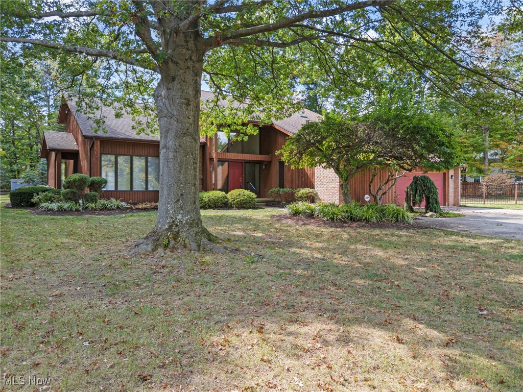 Welcome to this stunning custom-built, one-owner home tucked away on a private cul-de-sac. The mature, professionally landscaped lot provides a picturesque setting for this beautifully maintained residence. Inside, you'll find an updated, state-of-the-art kitchen and baths. The impressive two-story foyer opens to a large great room with vaulted ceilings, while the family room features a wet bar, built in shelving and indirect lighting, while a screened in porch off the kitchen/dinette makes for the perfect seasonal retreat. 1st floor den/library with built in cabinets and shelving supports work at home lifestyle. Upstairs, there are four spacious bedrooms, with a fifth bedroom on the finished lower level that includes an adjoining full bath with egress window for safety. The basement also provides a large recreation area, playroom, workout space, and ample storage with built-in shelving and wine rack. Additional highlights include a nature stone garage floor with exit door to the backyard and extra storage space. This home truly has it all-schedule your showing today, it will not disappoint!
