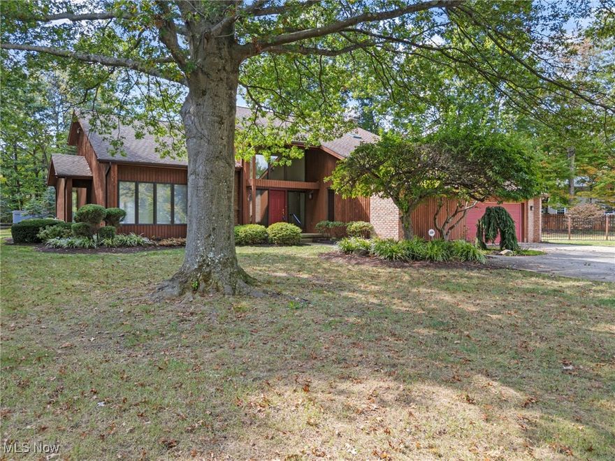 Welcome to this stunning custom-built, one-owner home tucked away on a private cul-de-sac. The mature, professionally landscaped lot provides a picturesque setting for this beautifully maintained residence. Inside, you'll find an updated, state-of-the-art kitchen and baths. The impressive two-story foyer opens to a large great room with vaulted ceilings, while the family room features a wet bar, built in shelving and indirect lighting, while a screened in porch off the kitchen/dinette makes for the perfect seasonal retreat. 1st floor den/library with built in cabinets and shelving supports work at home lifestyle. Upstairs, there are four spacious bedrooms, with a fifth bedroom on the finished lower level that includes an adjoining full bath with egress window for safety. The basement also provides a large recreation area, playroom, workout space, and ample storage with built-in shelving and wine rack. Additional highlights include a nature stone garage floor with exit door to the backyard and extra storage space. This home truly has it all-schedule your showing today, it will not disappoint!