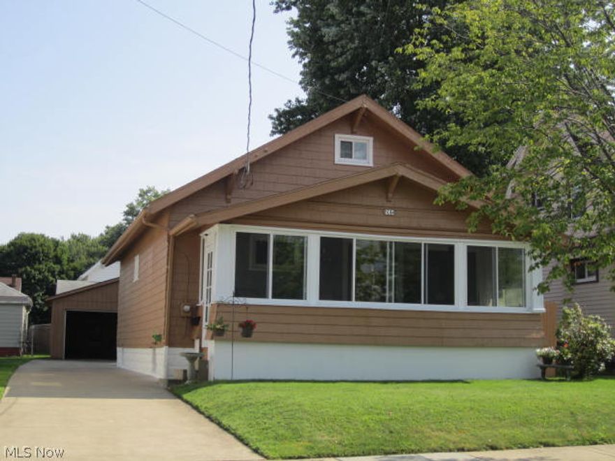 Great house in lovely neighborhood! Good living space here with large living room and large kitchen. Appliances include stove, refrigerator, and washer/dryer. Newer windows, basement glass block windows and enclosed porch with newer windows. Garage with opener plus carport.

Not a short sale.