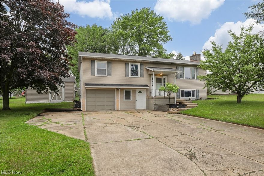 Nicely updated bi-level located in Perry Township situated on a corner lot with a backyard made for entertaining!! Upon entering the front door, steps lead up to the bright living room, dining area, and kitchen. Three bedrooms and an updated full bath complete the first level. Large deck off dining area with steps down to a nice sized fenced back yard perfect for those summer parties or kid's play area. Downstairs enjoy a spacious family room, fourth bedroom, additional full bath and a nice sized storage area. Freshly painted and all new flooring…This one is move-in ready!!