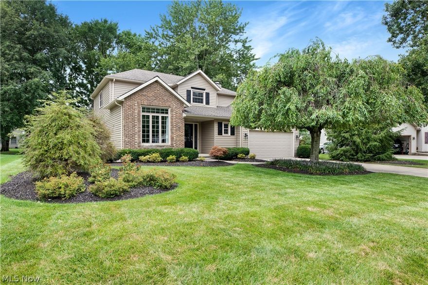 Prepare to be Moved...into this beautifully updated and stylish colonial nestled on a lovely tree lined street in North Olmsted! Greeted by a welcoming front porch you will be wowed by the gorgeous curb appeal with its exquisitely landscaped yard, new siding, windows, roof and custom front door. Gleaming hard wood flooring adorns the foyer and flows through to the kitchen and you’ll find a wonderful palette of today’s modern colors, ready for any style décor. The eat in kitchen features new granite counters, ample storage and a breakfast bar overlooking a step-down family room with wood burning fireplace.  Just off the kitchen you’ll find a sliding door to a park like back yard with shade and privacy from beautiful mature trees and a stunning stamped concrete patio.  Four spacious bedrooms all up, including a dream owners suite with vaulted ceiling, large walk in closet and private en suite and A newly updated main bathroom.  The lower level is partially finished while still keeping pl