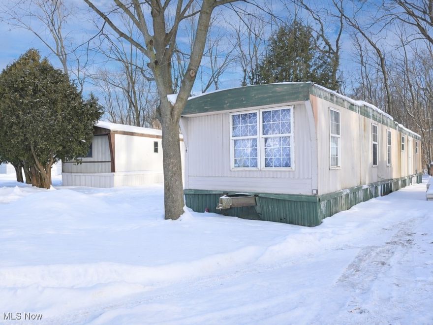 Affordable homeownership opportunity! This 3-bedroom, 1-bath manufactured home offers a practical layout with plenty of space for everyday living. The kitchen appliances will stay, making your move even easier. Located in a community with an estimated lot rent of approximately $445/month, which includes trash and water, this home is a great option for buyers looking for a budget-friendly place to call their own. Whether you're looking for a starter home, downsizing, or an investment opportunity, this property has tons of potential at an accessible price point. Schedule your showing today!
