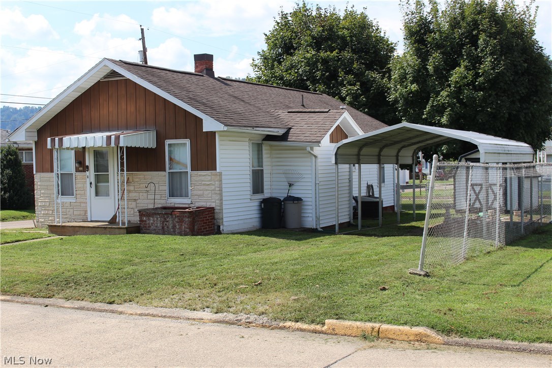 Cozy two bedroom home with fenced in backyard on a corner lot.