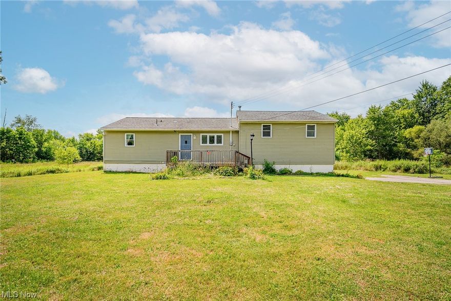 Did someone say almost 10 acres with a 5 bedroom 2 bath house?! Yes, that's right! That's what this new listing offers with an unfinished, partial, walk-out basement and oversized 2 car garage! This house sits just outside of town with public water and sewer utilities. Enjoy the benefits of city living with plenty of country land to call your own. Don't walk, run and Schedule your showing today!