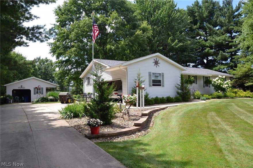 Care Free-First Class Quality. If you’re searching for a Premier Ranch with PUBLIC WATER, PUBLIC SEWER, and NATURAL GAS HEAT, your search is over! This One Owner, 3 BR Ranch (built 1990) offers the discrete Buyer with so much. The moment you enter, you’ll notice the Quality & Care the Home has to Offer: Oak Kitchen with Hardwood Floor; Vaulted Living Room with Pellet Stove; the Living Room opens directly to a 16 x 10 Patio Enclosure; 2 Full Baths; 1st Floor Laundry; Central A/C; Full Basement with an 18 x 12 Recreation Room; 2 Car Attached Garage;1Car Detached Garage; and 190 foot Concrete Drive.  Situated on Plush 1.76 Acres with Stocked Pond and Outbuilding. Upgrades include: Furnace, A/C, and Humidifier - 2 Years Old.  All Roofs on Home, Detached Garage, and Outbuilding - 4 Years Old. Convenient Location near I76 and Neo - Med University. Rootstown Schools. 1 Year Home Warranty included. This is a Must See!