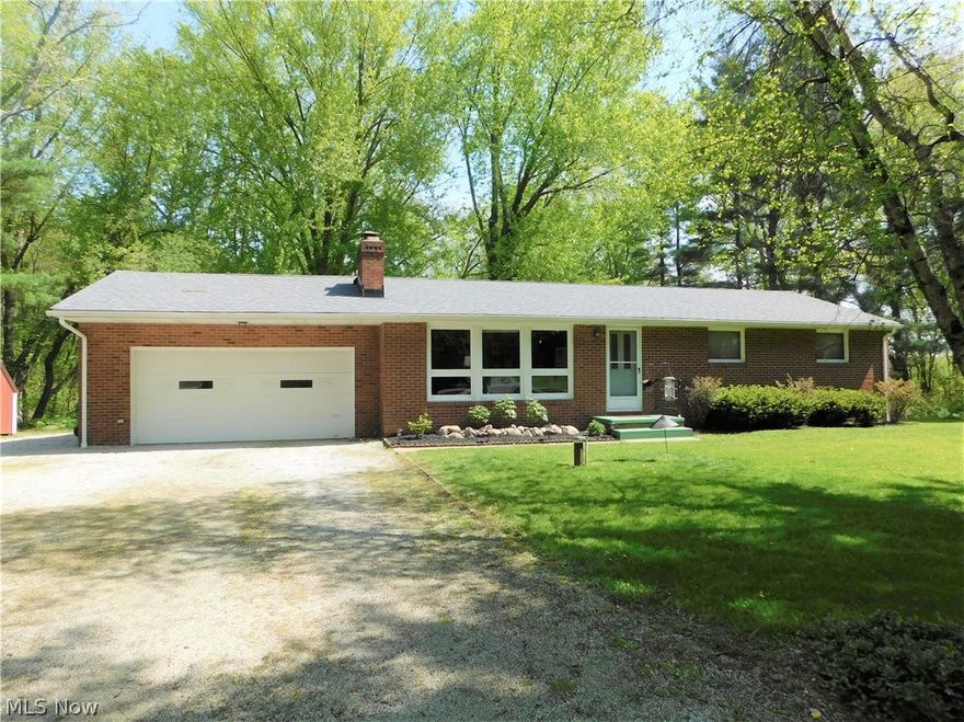 Fabulous all brick completely updated ranch just a short walk to the sought after Willowdale Lake! This beauty sits on a quiet cul-de-sac with a gorgeous wooded view in the back! Spacious living room with hardwood flooring, huge picture window and wood burning fireplace!  Eat in kitchen area with bright white built in shelving, slider door that leads to BRAND NEW HUGE (18'x32') deck and private wooded backyard!  The kitchen has white cabinetry, newer butcher counter-tops, subway tile backsplash, newer faucet,  reverse osmosis water filter system (2016) and stainless steel appliances (all replaced in 2018) that remain with the property!  Master bedroom with hardwood flooring and it's own 1/2 bath!  Two other good sized bedrooms also with hardwood and a full bathroom complete the first floor!  The basement features a finished room that is currently used as an office but could be a hobby area, play room; workshop, and plenty of unfinished space that you could finish as you like OR just us