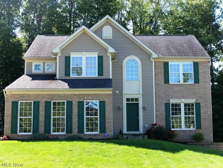 Gorgeous 4 bedroom, 2.5 bath home with open concept on the main level and fantastic back deck! Inviting 2 story foyer opens to the formal dining room. Spacious great room with French doors to a bonus room - would make a great first floor office. Beautiful open kitchen with huge center island comes applianced with refrigerator, dishwasher, oven and range and has new vinyl flooring. Stunning morning room has vaulted ceilings, a wall of windows and access to back deck. Brand new laminate flooring on the main level! Freshly painted throughout! First floor half bath and laundry room, too - very convenient. Huge master suite with massive walk-in closet and private full bath with garden tub and double sink vanity. There's an additional full bath on the second level and three large bedrooms with great closet space! 2 car side load garage with expanded driveway, too. Beautiful yard with storage shed and large tiered deck great for entertaining! A must see!