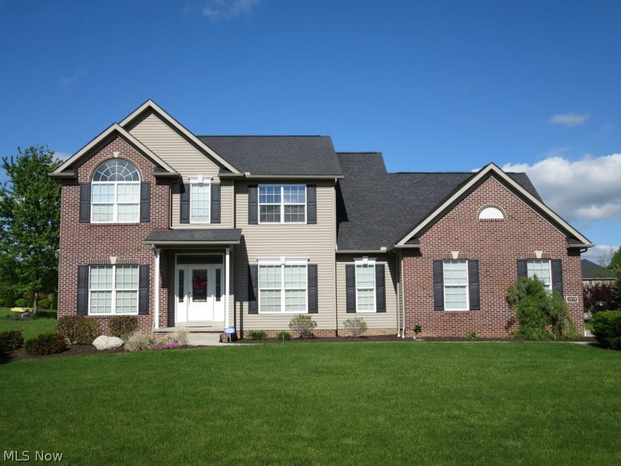 You'll forget about building when you see this Mosley built colonial in Creekside Ridge because it's like new! Wonderful open floor plan with expanded family room with fireplace, cooks kitchen and morning room with vaulted ceiling and skylight.  The first floor also has a home office with french doors, formal dining room and laundry room with extra cabinets and utility sink.  There's hardwood from the foyer through to the dinette and kitchen.  The kitchen is gorgeous with 42 inch cabinets, granite counters, center island and all appliances.  Upstairs the four bedrooms all have ample closet space plus the master has two walk-ins.  The basement has a poured foundation, hi-efficiency furnace and water heater and a high end triple sump pump system and a rough in for a future bath.  The 3 car side entry garage has water and floor drains and oversized driveway.  There's a stamped concrete patio and a garage-sized outbuilding with electric and set up for water and radiant heat in the floor.