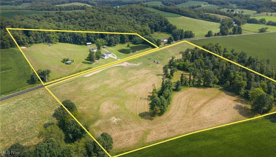 Lot #1: This land is being split off of a larger parcel. Exact acreage to be determined but it will be around 10 acres. An additional neighboring 10 acres is also for sale. Land has some newer fencing, woods, pasture, creek. Beautiful views of rolling hills.