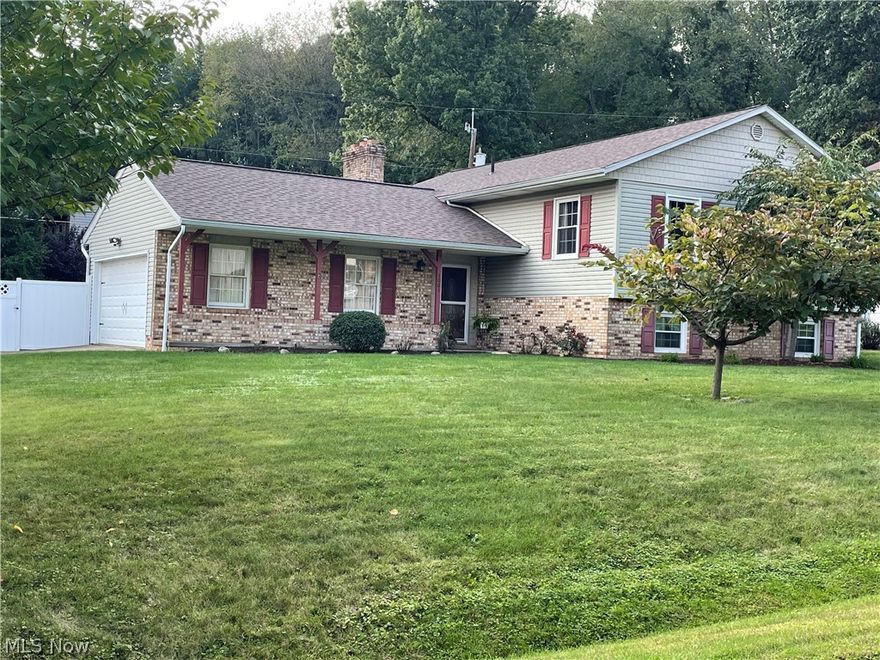 Don't miss this one! Lovely well maintained 4 Bedroom, 2 full baths raised ranch in NW Perry Twp. Excellent corner lot location next to Cliffwood. The vinyl fence on the side has a large gated opening to a paved pad in the backyard. Great for RV, car or basketball court. This spacious home features a large open living room that leads into a kitchen with newer refrigerator and plenty of cabinet space. An adjoining dining room exists for the eating area. There are 3 bedrooms on the main level and an updated main bath with a fully tiled shower. The gorgeous large owner's bedroom with huge bathroom that includes a jetted tub and shower along with a walk in storage closet. Plus, a heated floor system for those cooler nights! This could be an in-law suite if needed. Check out the large recreation room that's great for entertaining. It features a large brick fireplace, access to bathroom, and walk out sliding door to the backyard. Bonus, there's a shed for additional storage. Call now for an