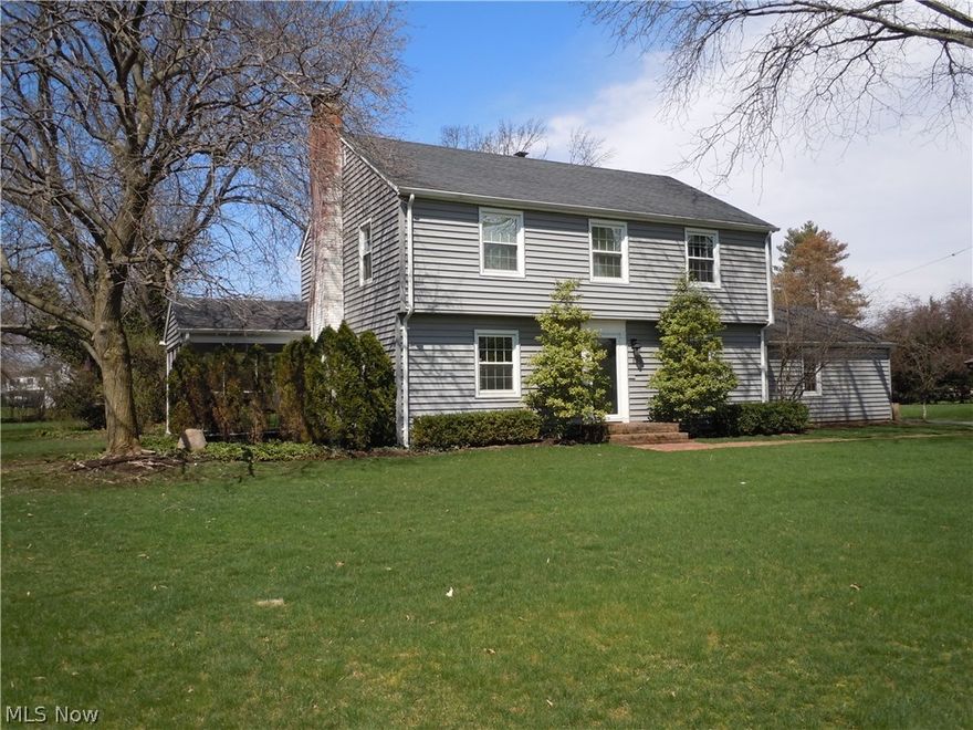 This exceptional 4 bedroom 2.5 bath two story home has so much to offer and has many recent upgrades. The remodeled kitchen features stainless steel appliances including high-end six burner gas stove and hood, granite countertops, built-in wine rack and tile floor. The large living room offers a fireplace, crown molding, wood flooring and opens to a screened sun room. A first floor den with built-ins is a perfect place to work and the large sunken family room with vaulted ceiling and wood floor is the perfect place to relax. The first floor master suite has a vaulted ceiling and is highlighted by a luxurious remodeled master bath with a large walk-in tile shower. The second floor has three additional bedrooms and an updated full bath. The basement provides more living space with a generous sized rec room with wet bar. Amazing and private .64 acre lot offers a stone patio and plenty of room for recreation.  Additional updates include roof, siding, gutters, windows, doors, electric, wate