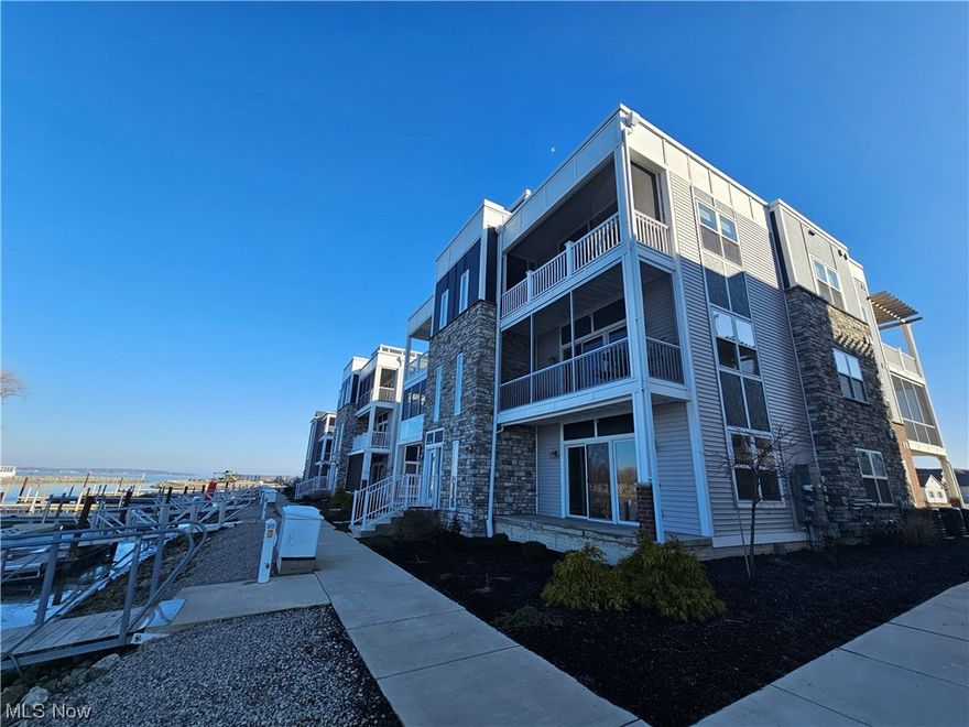 A waterside top floor move in ready summer getaway home in Lakeside Marblehead. Panoramic water views from your screened in front balcony and a shared rooftop deck above offering bay views all around! A private master suite balcony with open skies above, 2 additional bedrooms, 2 full bath and all appliances included. Just steps from the pool and beach!

At Marblehead Estates & Yacht Club there is a natural sand beach, bay front clubhouse and inground pool, beach patios, live weekend events, and even more! Come take a look! Dockage and garage storage available too!