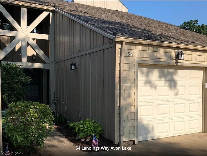 Move-in-ready! Enjoy the ease and convenience of condominium living that is located just minutes from Shopping, Restaurants, Entertainment, & the Lake! The Living Room is the heart of this unit and will allow you to relax and unwind in a place you will want to call Home! It features a Wood Burning Fireplace and Hickory Hardwood Floors and has a dining area with breakfast bar where you can entertain guests! The back patio is very private and a delightful nature retreat. The new hickory kitchen cabinets feature plenty of storage and prep space and are accented by beautiful concrete counter tops, farm size copper sink, slate floors, and back splash! Upstairs you will find two bedrooms including a spacious 15' x 14' Master Bedroom with plentiful closet space. The Second Bedroom can be a great space for a Home Office too! Also, on the second floor is a large walk in storage area over the garage as well as pull down stairs to an attic. The basement features a Workshop, Laundry Room (with br