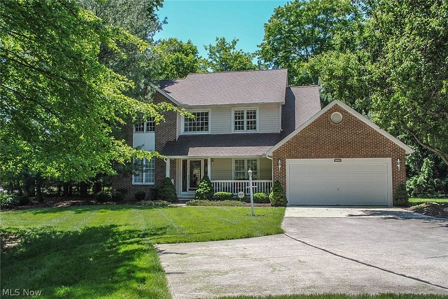 Sparkling Clean Free Standing Cluster Colonial In A Single Family Like Wooded Atmosphere .... Wonderful Wooded Setting Near Metro Park .... Very Private And Very Special .... Cozy Family Room With Fireplace And Hardwood Floors .... Bright Kitchen With Large Eat In Table Area And Hardwood Floors .... 1st Floor Utility .... Three Spacious Bedrooms, Including A Wonderful Master Bedroom Suite With Cozy Romantic Fireplace, Walk In Closet And Jacuzzi .... 2.5 Baths .... Clean Basement With Storage Space Galore .... Inviting Front Sitting Porch .... Gigantic Deck .... Newer Roof ....  Newer Siding .... Two Car Attached Garage .... Monthly Maintenance Fee $250 .... Includes Lawn Care And Snow Removal ....