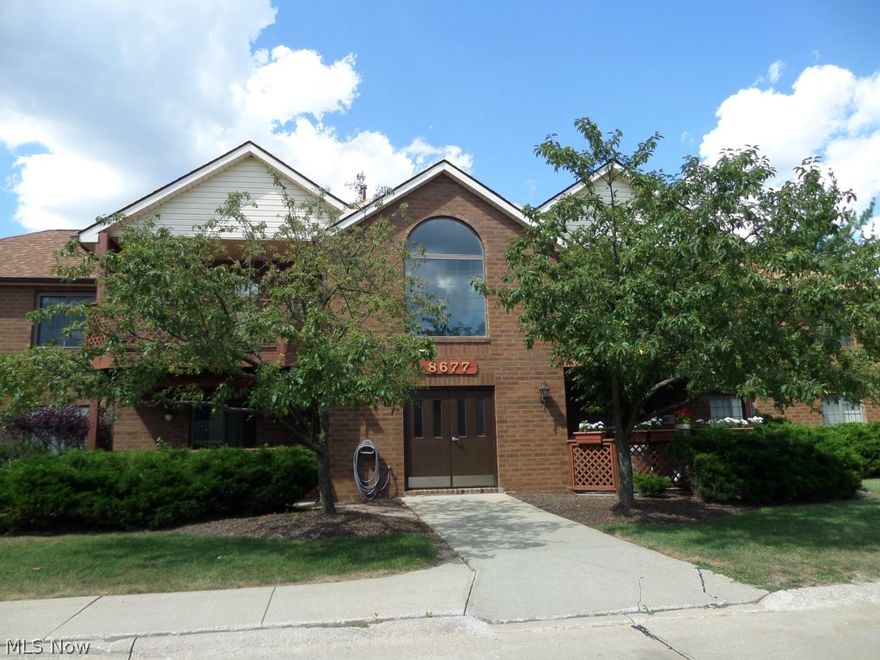 Desirable first floor end unit that looks out over the green area. Large deck off living room. Spacious at 1200 SF. Unit offers kitchen, living room, dining area, master bedroom with master bath, guest bath and second bedroom. One car garage is close by and walled off for privacy. A must see.