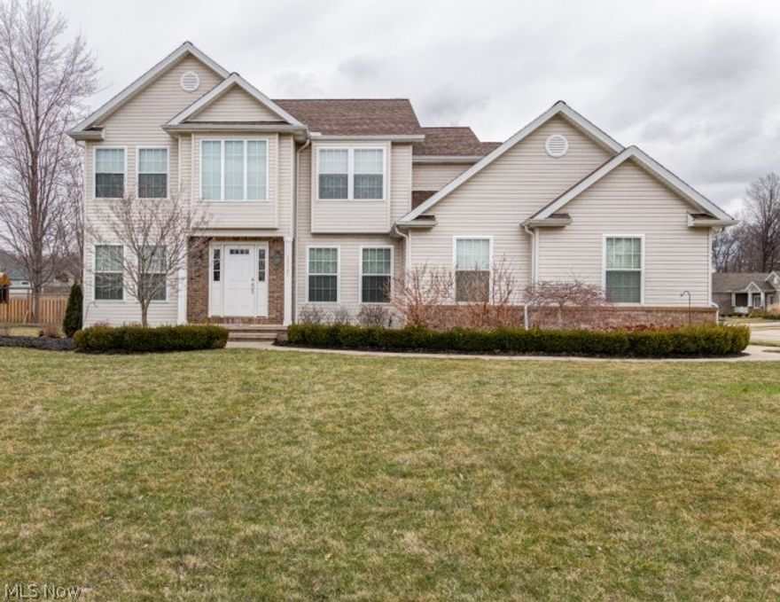 If location and condition are important to you, this is the perfect home! This exceptional Willoughby Barr Construction built corner lot home has been meticulously maintained. Close to shopping and convenient to freeways. As you enter this inviting home the gleaming wood flooring is striking. The formal dining room is spacious, perfect for entertaining. The paneled fireplace is the focal point of the expansive open concept family room. The gourmet kitchen boasts newer top of the line gas stove, microwave and dishwasher. The second story master suite has a jetted soaking tub, double vanities and a huge custom closet system. The remaining two bedrooms and full bath complete the second floor. The carpeted finished basement has a rec area, plumbed for an additional bath. Paver patio with beautiful landscaping finish this lovely home. You will be proud to call this home!