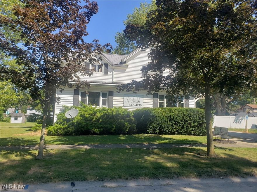 Dream come true , this property has huge income potential . This hair salon consists of 4 booth areas for hairdressers. The shampoo area has 3 shampoo bowls . There are 4 hooded dryers available, one for each stylist. A common area for clients to relax and wait for their appointment . The salon also has a nail spa room.2 private areas for storage, color mixing and laundering of towels. This also serves as a break area for the salon staff. An available room for massage therapy or skin care, etc. A barber shop exists in the back area of the salon with a private entrance. A upstairs apartment 1 bedroom , living room, kitchen , with A full bath with A shower. Parking area available at the back of the salon as well. Large storage building for possible storage income.