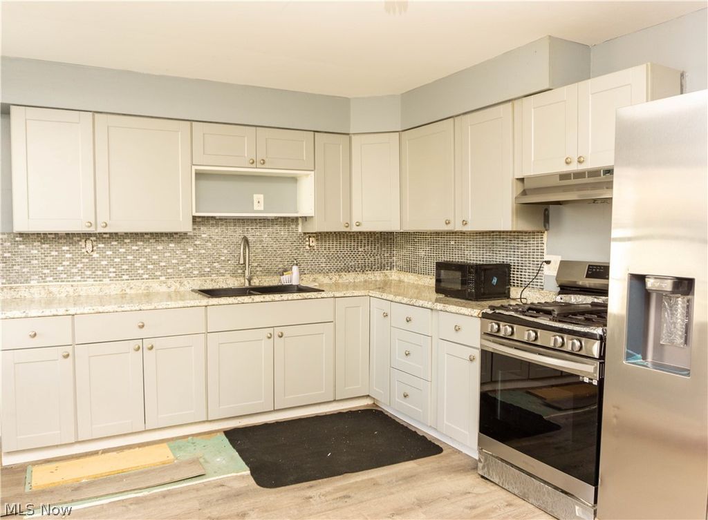 Photo of 5416 Stanard Ave, Cleveland, OH 44103 (MLS # 5200633)