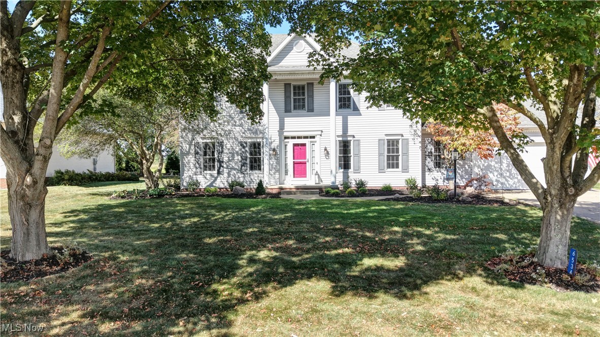 Stunning 4 BR, 2 full bath, 2 1/2 bath, 3562 sq, ft, colonial home in desirable Jackson Twp. location. Enter into the welcoming foyer with hardwood. 1st floor includes a large eat-in kitchen with center island that has great storage, granite countertops, desk for sorting all of your mail, subway tile backsplash. There is a formal dining room with vaulted ceiling that is perfect for entertaining. Large opening from kitchen to great room has a wood insert fireplace, ample windows and natural light. French doors take you from great room to a formal living room perfect for reading a good book. Laundry room with sink and cabinetry, (washer and dryer included), office and half bath complete the 1st floor. On the second floor, you will find 4 spacious bedrooms, large closets and built ins. The 20X14 master suite has an inviting jacuzzi tub, 2 vanities and a huge walk-in closet. A large full bath with double sinks and linen closet completes the wonderful upstairs space. Wait until you enter the amazing lower level! Beautiful staircase with double handrails with decorative wrought iron take you to a 21 X 12 family room with beautiful built-in cabinetry and gas fireplace. There is also an incredible 27X26 recreation room with a wet bar that includes a full-size refrigerator, dishwasher, wine fridge, microwave, 2 countertops and tons of cabinets, a perfect area for family gatherings. There is also another half bath, hidden storage under the steps and a utility room with a 27-gallon tote storage system. Central vacuum. Recent improvements include landscaping, carpet throughout, backsplash, refrigerator, ceiling fans, light fixtures inside and out, furnace, A/C, gutter guards and fresh paint. Outdoor living is wonderful, with a large deck, brick patio and fire pit. Beautifully landscaped.
Schedule an appointment to view this wonderful home!
All room measurements are approximate.